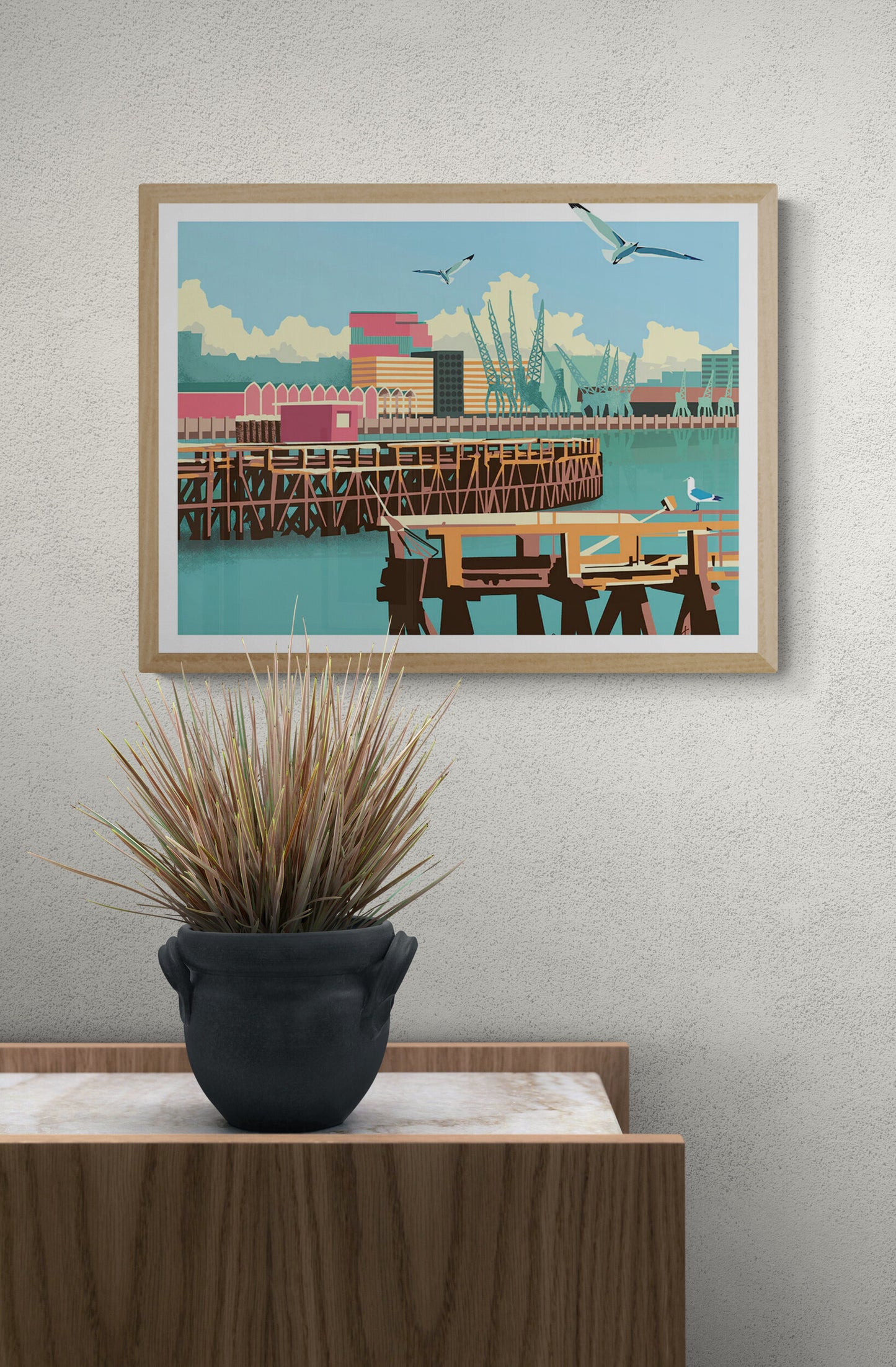 Colorful cityscape illustration by Studio Frits titled 'Antwerp Northcastle,' featuring the industrial harbor of Antwerp with cranes, docks, and seagulls under a bright blue sky. Rendered in a bold, graphic style with retro tones, this print captures the urban charm and maritime identity of Belgium’s iconic port city—perfect for modern interiors and city art lovers