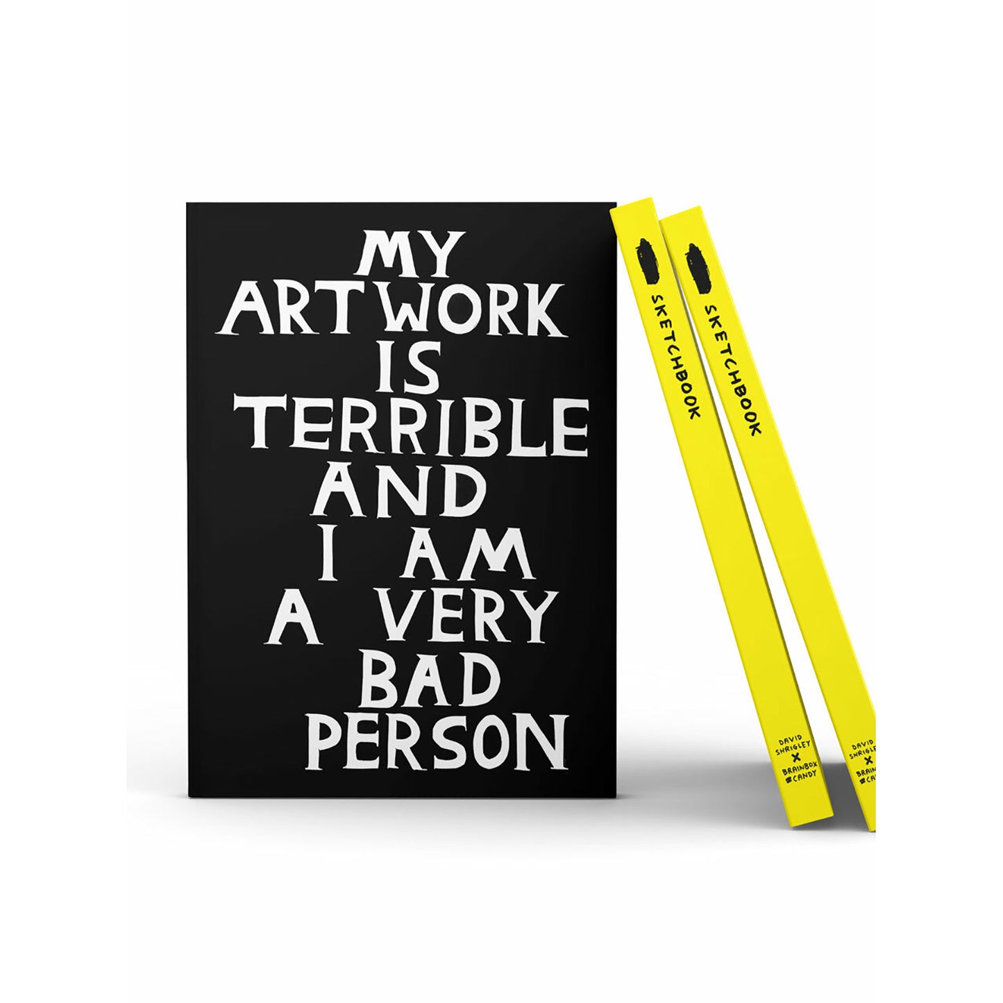 David Shrigley A5 sketchbook with bold white handwritten quote “My artwork is terrible and I am a very bad person” on black cover – perfect bound with 144 blank pages for drawing or sketching.