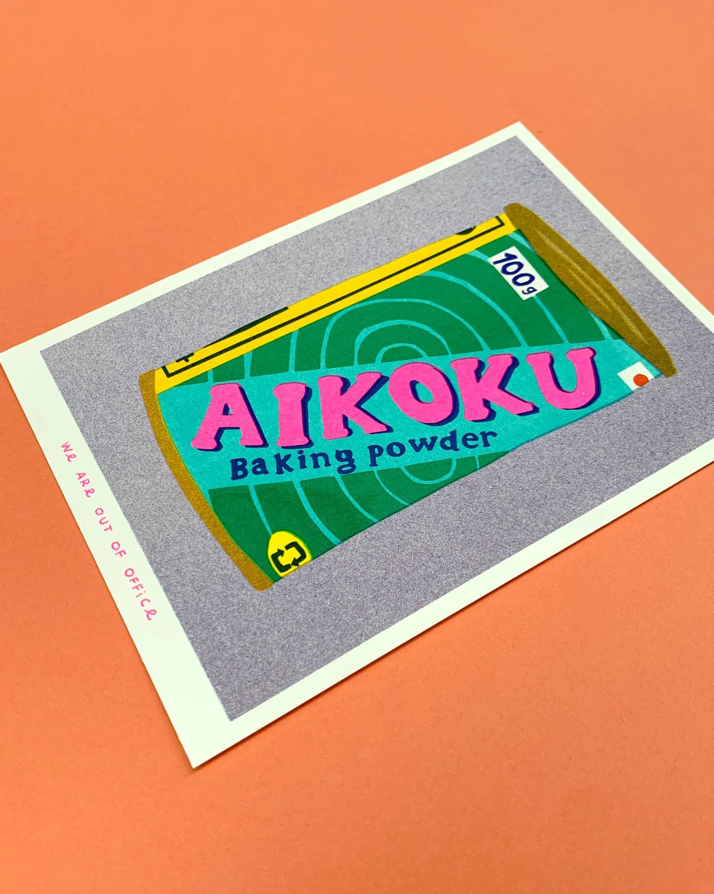 Colorful risograph print of a vintage Japanese Aikoku baking powder can by We Are Out of Office – pop-art kitchen illustration with pink, teal, and yellow details on Biotop paper.