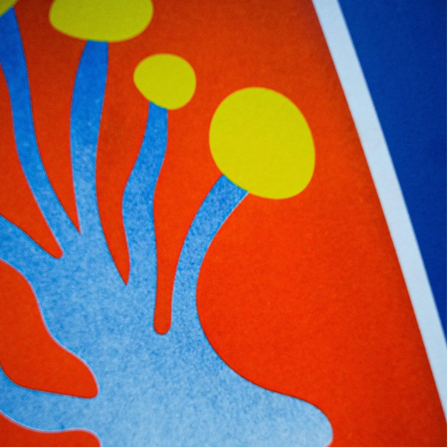 Blue and yellow funky mushroom risograph print by Dutch illustrator PTRVRKD – playful abstract botanical design with organic blue stems, bold yellow caps, and fiery orange background, printed with eco-friendly soy inks on 250 gsm Biotop paper, handmade in the Netherlands – quirky small art print for modern interiors.