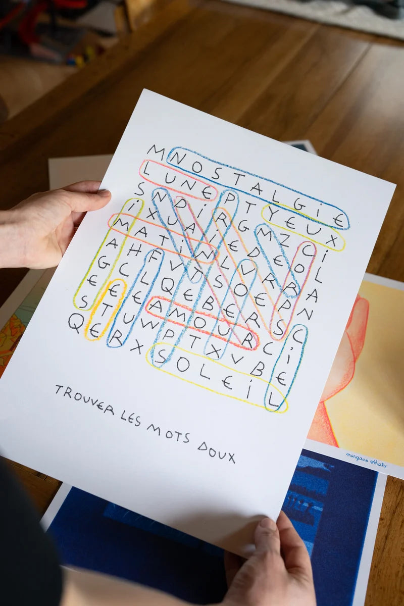 Risograph art print “Les mots doux” by Paul Lecat – colorful word search illustration featuring French words like “amour,” “soleil,” and “nostalgie” drawn in soft red, blue, and yellow lines on white background, poetic modern wall art in A3 format.