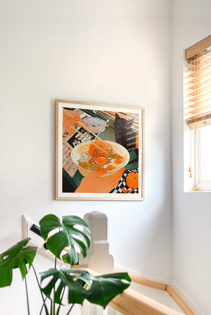Midnight Noodles by Enikő Eged, 50 x 50 cm archival giclée art print featuring a cozy noodle bowl scene with a black cat, warm orange tones, and Japanese-inspired details.