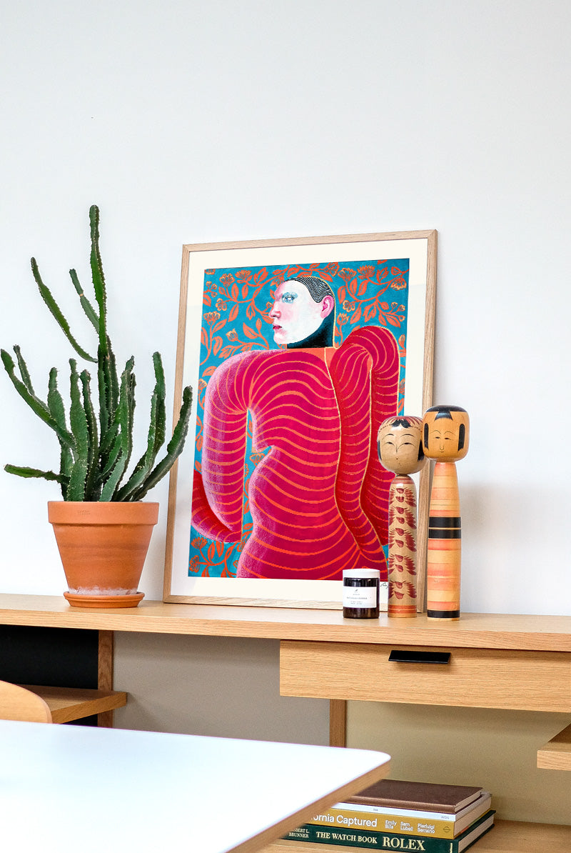 Goddess Of Flirting by Carla Petelski, contemporary figurative digital art print featuring a surreal pink striped female figure against a blue floral background, modern colourful wall art, 50 x 70 cm