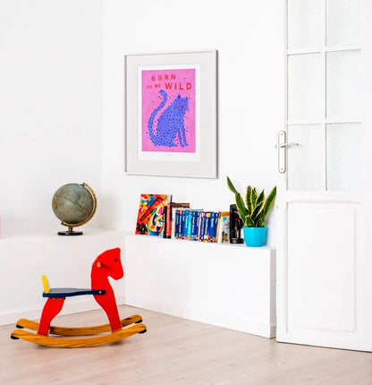 Born to Be Wild cat illustration by Just Cool Design – playful modern art print featuring a blue spotted cat on a pink background with bold red typography, fun and quirky wall art for cat lovers and vibrant interiors, available at Galerie Frits