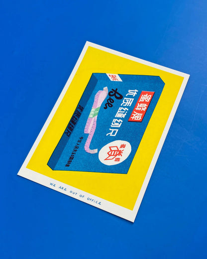 Risograph print of a Chinese Bee brand cloth measuring tape box in bright blue and yellow, created by We Are Out of Office – retro sewing supplies artwork on 300g Biotop paper.