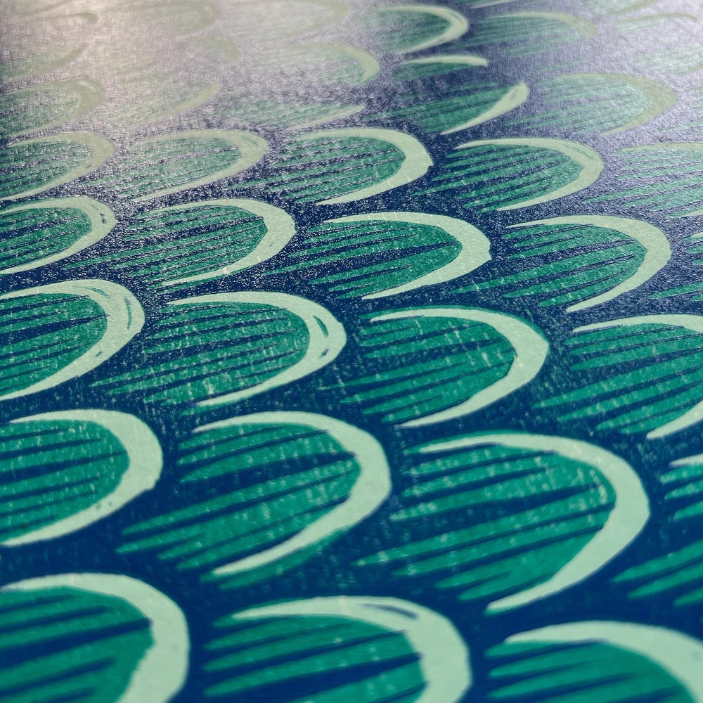 Limited edition 50 x 70 cm woodcut titled Waddle I Do by Northern Irish artist Strangford. Features a whimsical blue bird with expressive eyes and intricate feather textures, hand-printed using oil-based ink on 300g paper. Edition of 90, handcrafted in Northern Ireland.