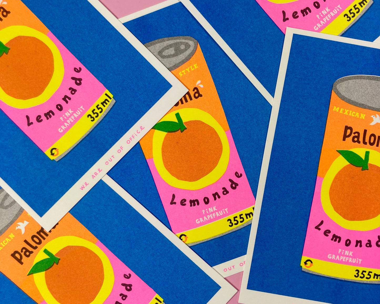 Colorful risograph print of a retro-style Paloma lemonade can with pink grapefruit label on blue background – Paloma Lemonade by We Are Out Of Office, 13 x 18 cm art print.