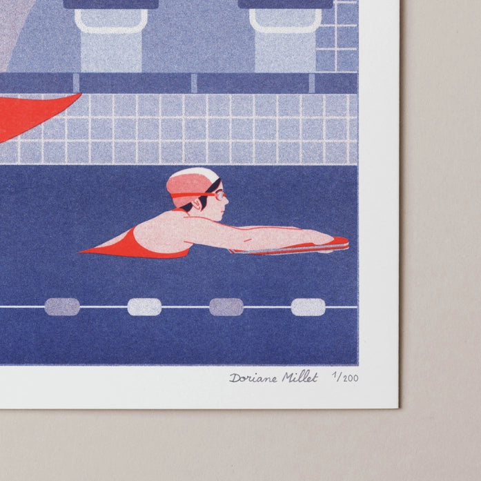 Risograph print titled "Swimmer" by French illustrator Doriane Millet, showing a whimsical indoor pool scene with a swimmer and a red mermaid tail beside her, set against a geometric tiled background in shades of blue and coral; A4 limited edition art print ideal for modern interiors and collectors of narrative illustration.