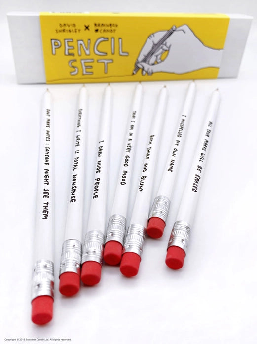 David Shrigley pencil set with 7 silver HB pencils in a yellow gift box, each featuring a humorous phrase by the British artist—ideal creative gift made in the UK for fans of quirky art and stationery.