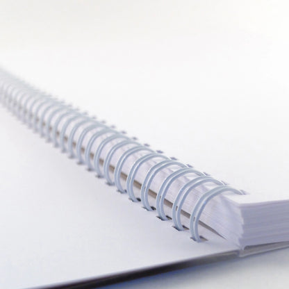 Colorful mosaic A5 sketchbook by Weew Smart Design, featuring a vibrant hexagonal pattern cover and white spiral binding, with 100 blank pages on smooth 80gsm paper – perfect for daily sketching or creative