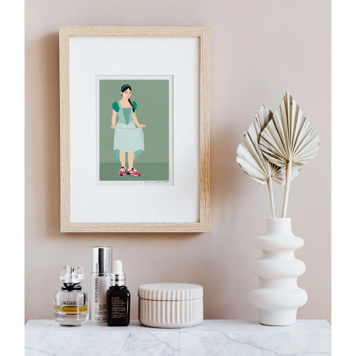"Feet on the Ground" by Doriane Millet – minimalist illustration of a modern girl in a fairytale-style dress and red sneakers, standing confidently on a muted green background; whimsical and empowering wall art print blending classic and contemporary styles, available at Galerie Frits