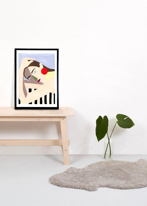 Giclée art print titled "Woman" by Spanish illustrator Depeapa, featuring a stylized female figure with red earrings and geometric color blocks on a soft pastel background, printed on A3 fine art paper.