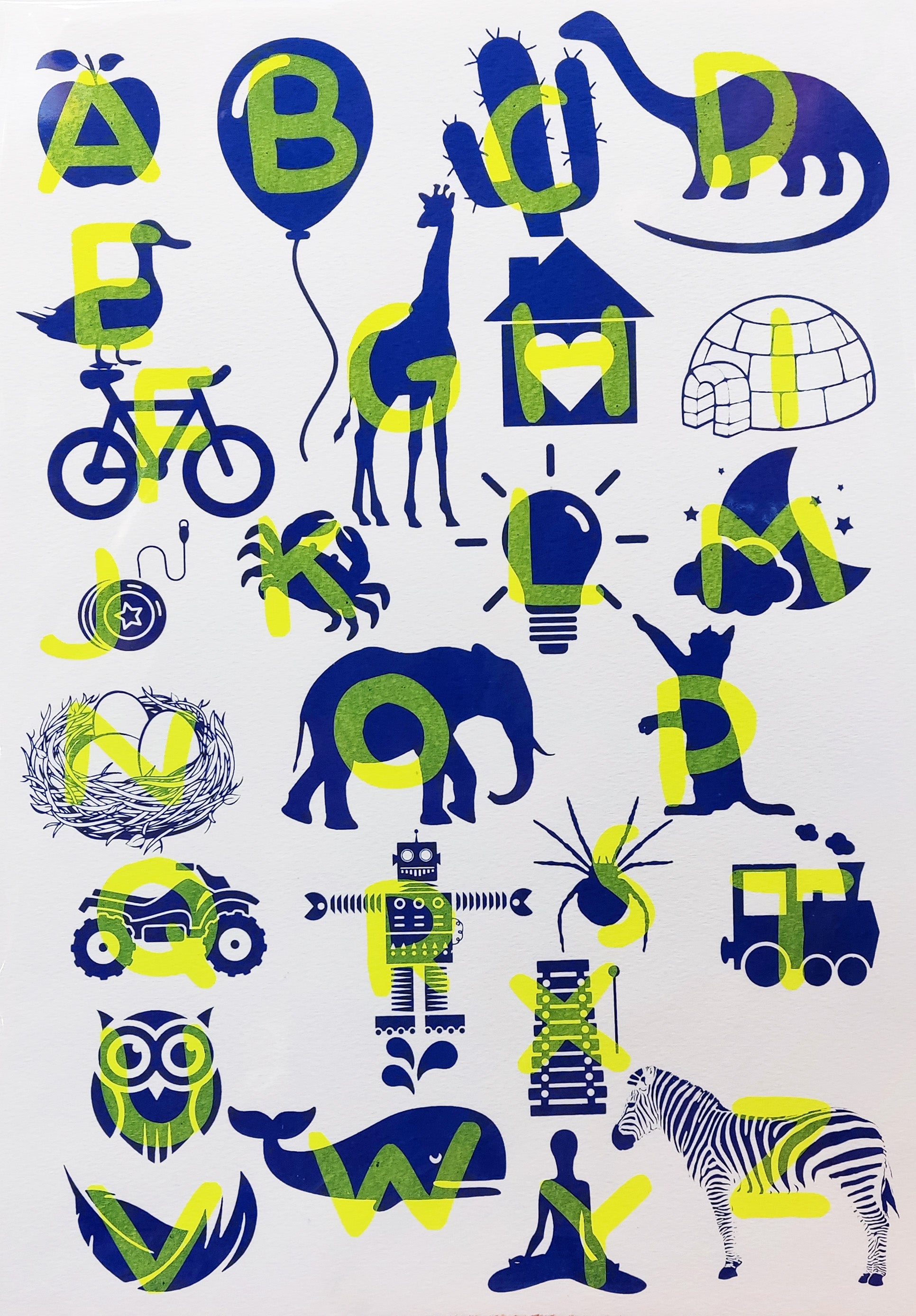 Playful and educational alphabet poster by De Zeverij featuring bold letters paired with charming red-blue or blue-yellow illustrations of animals, objects, and everyday items. Designed in a fun, screen-printed style perfect for children's rooms, classrooms, or creative spaces—an eye-catching blend of learning and modern design