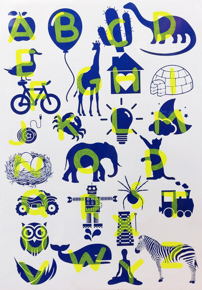 Playful and educational alphabet poster by De Zeverij featuring bold letters paired with charming red-blue or blue-yellow illustrations of animals, objects, and everyday items. Designed in a fun, screen-printed style perfect for children's rooms, classrooms, or creative spaces—an eye-catching blend of learning and modern design
