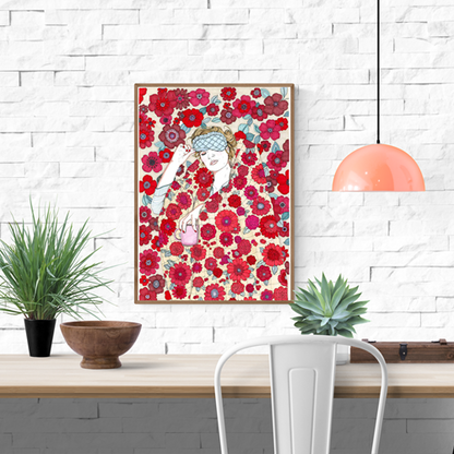 Art print by Ana Jarén showing a woman wrapped in a vibrant floral duvet with a pink coffee mug in hand, surrounded by delicate red and pink flowers — cosy, feminine, and ideal for interior decoration.