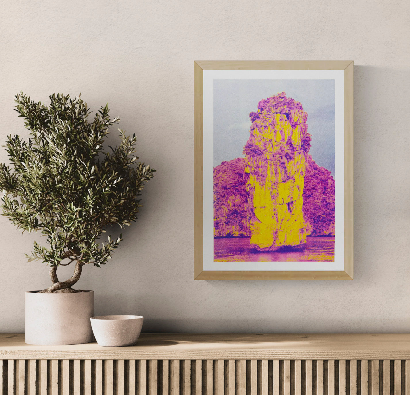Ha Long Bay risograph art print by PTRVRKD in bold yellow and magenta tones, limited edition A3 poster printed on Munken Pure Rough paper, modern vibrant landscape artwork for home decor, contemporary risograph print made in the Netherlands.