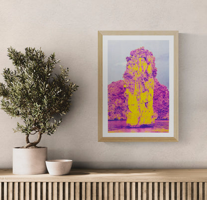 Ha Long Bay risograph art print by PTRVRKD in bold yellow and magenta tones, limited edition A3 poster printed on Munken Pure Rough paper, modern vibrant landscape artwork for home decor, contemporary risograph print made in the Netherlands.