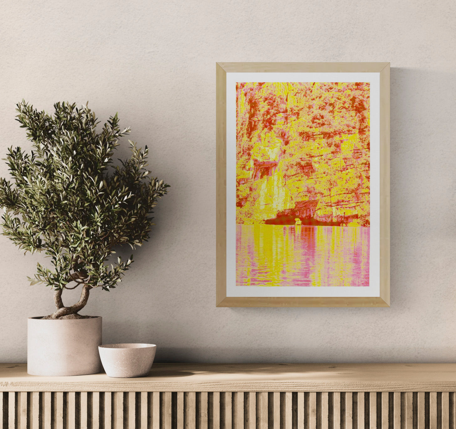 Vibrant risograph art print inspired by the cliffs and waterways of Ninh Binh, Vietnam, featuring bold neon yellows and pinks, textured rock formations, and reflective water. Contemporary limited-edition A3 artwork by PTRVRKD printed on Munken Pure Rough paper, perfect for modern interior decor.