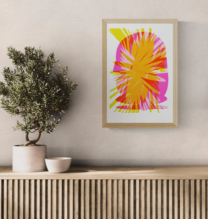 Abstract A3 risograph art print by PTRVRKD featuring vibrant layers of orange, pink, and yellow with bold, graphic explosion design – limited edition, handprinted in the Netherlands