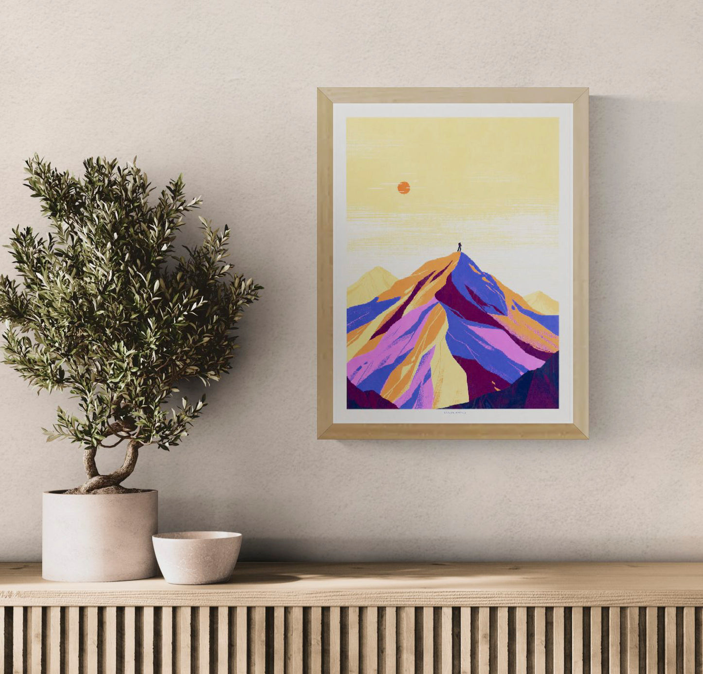 Vertical giclée art print of a lone figure standing on an Alpine mountain peak, illustrated in vivid purple, orange, pink and pale yellow tones, ideal as colourful wall art for a living room, office or studio.