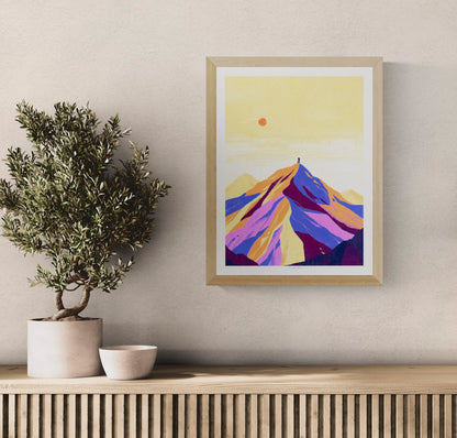 Vertical giclée art print of a lone figure standing on an Alpine mountain peak, illustrated in vivid purple, orange, pink and pale yellow tones, ideal as colourful wall art for a living room, office or studio.