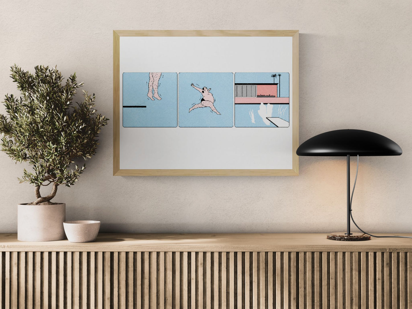 Limited-edition risograph print showing a humorous three-panel diving sequence by Studio Stoutpoep, featuring a playful swimmer, pastel blue background, bold graphic lines, and retro comic-inspired design for modern home decor.