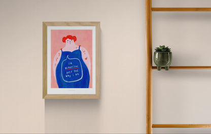 Bold and colorful illustration of a curvy woman with red hair confidently saying “I’m beautiful just the way I am” – empowering A4 art print by Just Cool Design.
