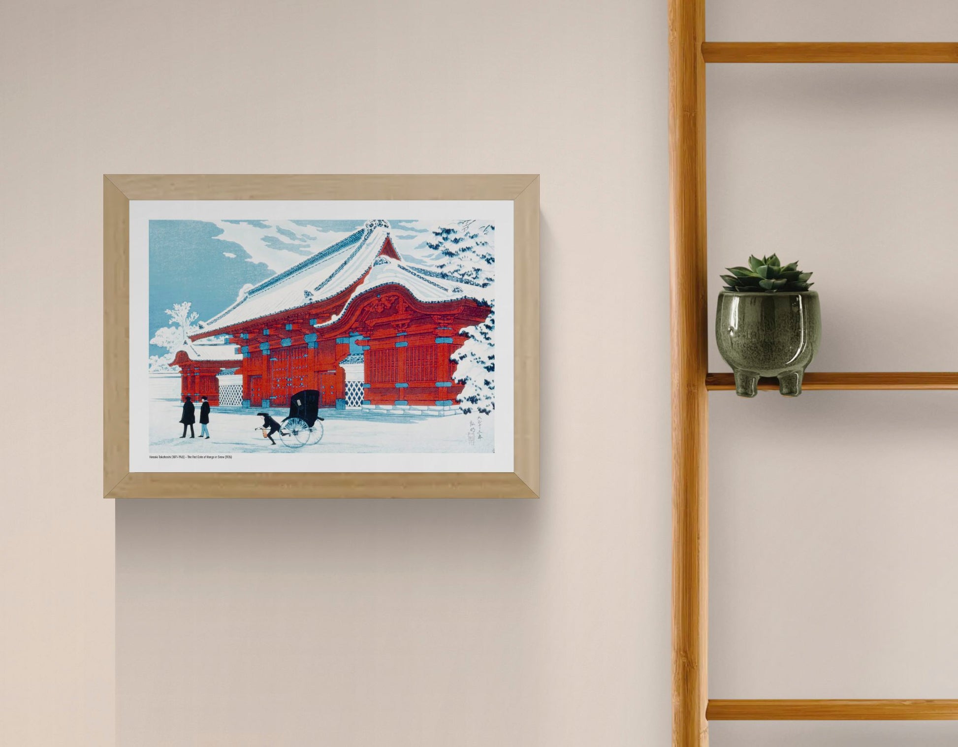 Horizontal Japanese winter scene showing a vivid red gate in Hongo covered with snow, a rickshaw and pedestrians, rendered in blue, white and red as decorative wall art.