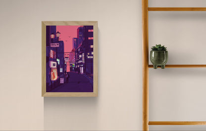 Fine art giclée print titled “Nights in Japan” by Valeria Maggiani featuring a cinematic Japanese city street at dusk with neon signs, warm shop lights, urban silhouettes, and a pink-purple evening sky, printed on 100% cotton textured paper A4 size, ideal for modern home decor and contemporary wall art in Belgium and Europe.