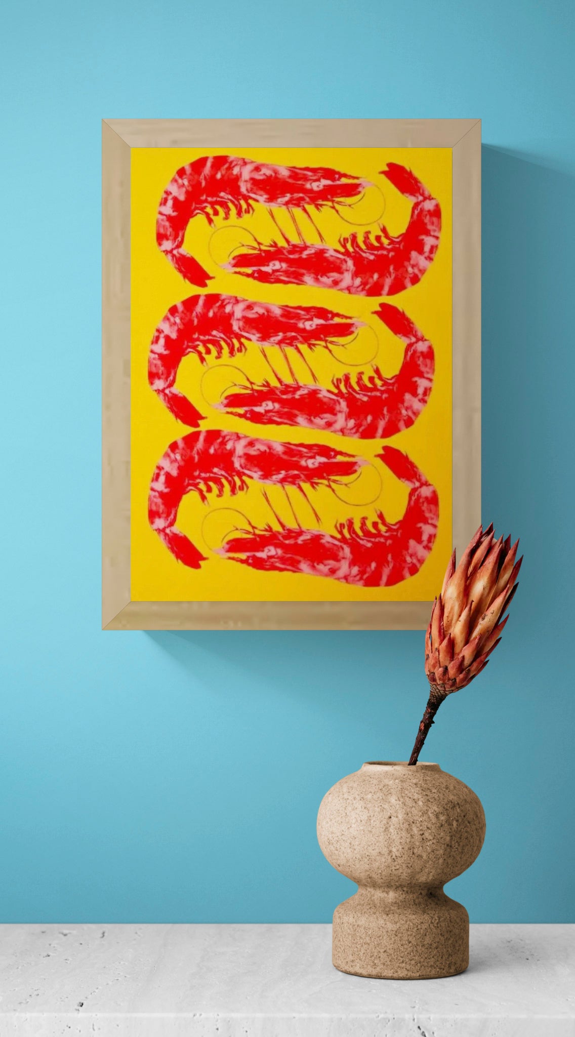 Bright yellow and red offset print of three shrimp by Dutch illustrator PTRVRKD – playful pop-art seafood design, bold color composition printed with eco-friendly soy inks on 250 gsm Biotop paper, handmade in the Netherlands – quirky small art print for modern kitchens or walls.