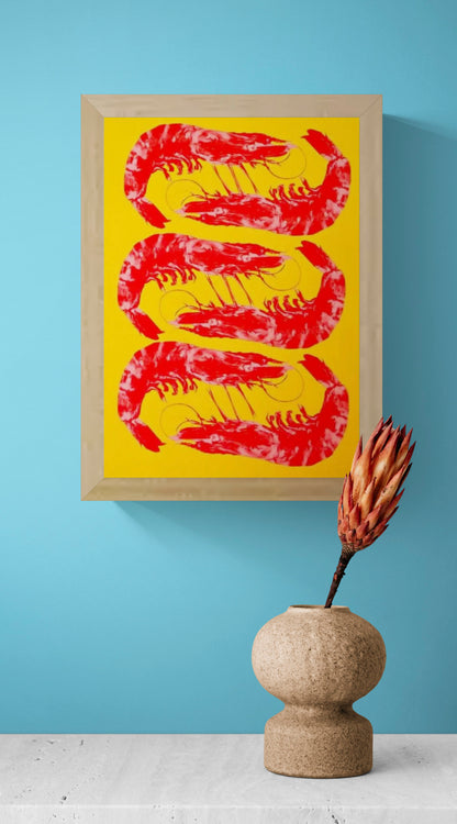 Bright yellow and red offset print of three shrimp by Dutch illustrator PTRVRKD – playful pop-art seafood design, bold color composition printed with eco-friendly soy inks on 250 gsm Biotop paper, handmade in the Netherlands – quirky small art print for modern kitchens or walls.