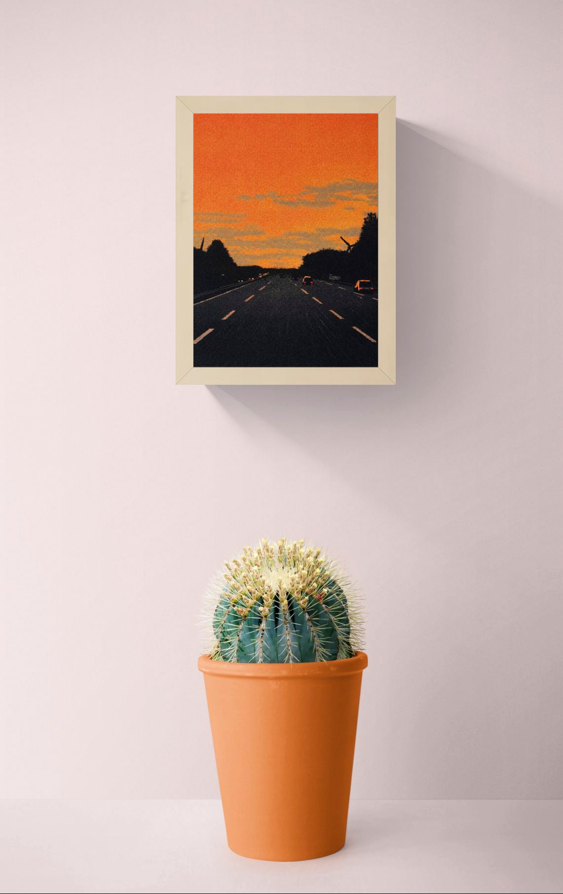 Vertical giclée art print showing cars driving along a dark motorway beneath a vivid orange sunset, with textured clouds and black tree silhouettes, ideal for modern hallway, office or gallery wall decor.