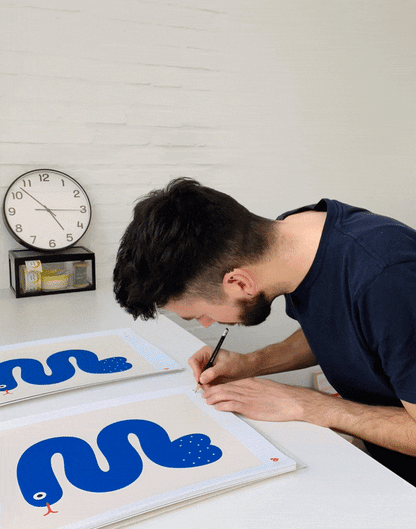 30 x 40 cm limited edition screen print titled Trouser Snake by Dicks Don’t Lie. Features a stylized, minimal blue snake with a humorous double meaning, printed in 4 vibrant colors. Hand-printed in the Netherlands, signed by the artist, edition of 25.