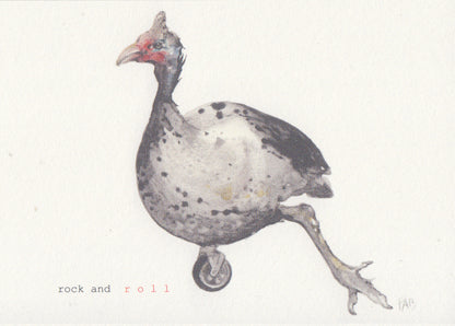 Surrealist illustration of a spotted guinea fowl balancing on a single wheel with the phrase "rock and roll" – small format art print by Belgian artist FAB, A6 size on textured paper.