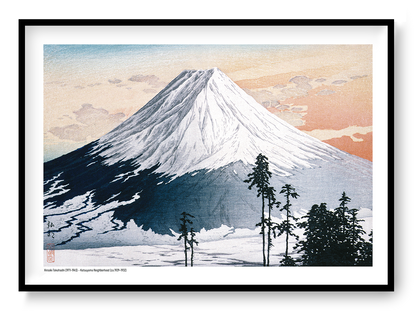 Landscape A4 art print of snow-covered Mount Fuji beneath a peach and blue sky, with dark pine trees in the foreground, based on a Japanese colour woodblock by Hiroaki Takahashi; horizontal wall art for calm interiors.
