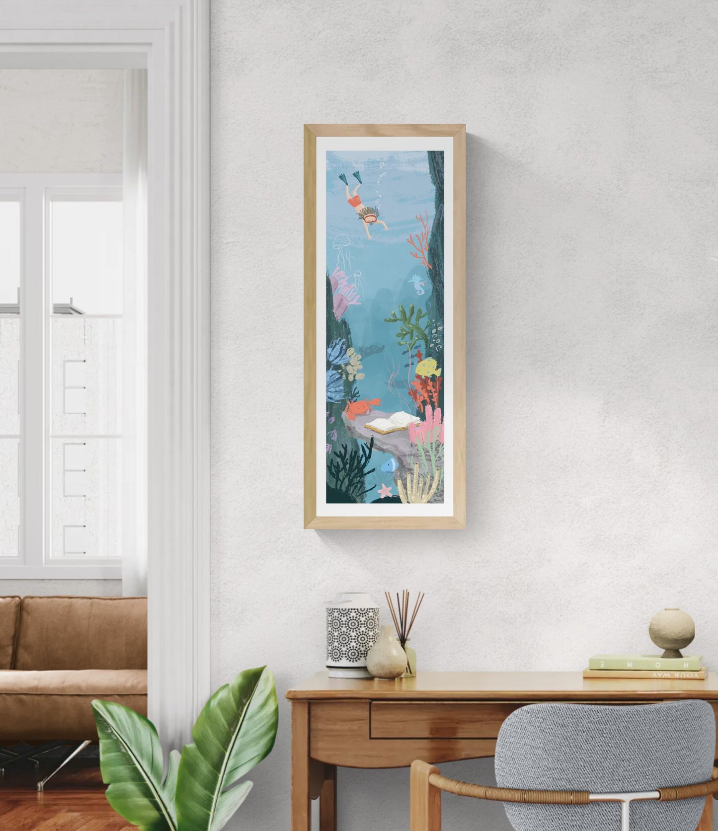 Vertical underwater illustration of a child diving toward an open book surrounded by coral, fish, jellyfish, and sea life in soft blue tones. Giclée art print by Willy Leung, ideal for narrow walls, staircases, and modern home decor.