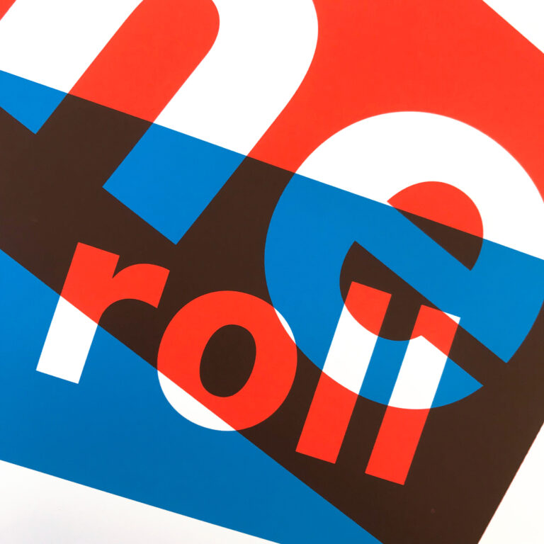 Three-color screen print ‘BABYDOLL’ by Dutch duo Gumbootz, featuring bold overlapping red, blue and grey text saying ‘baby doll you need some rock & roll,’ arranged in dynamic angled blocks on a 50×70 cm art poster; modern graphic typography artwork perfect for contemporary interiors.