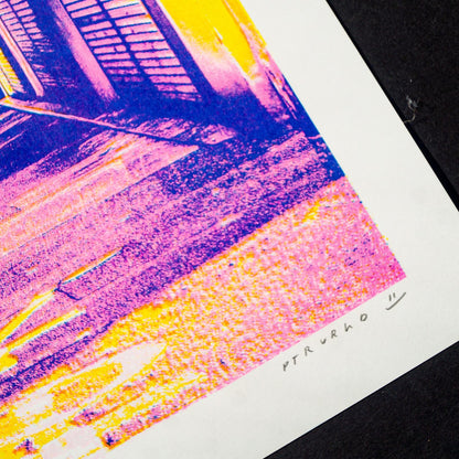 A3 risograph collage print of Fuji Street by PTRVRKD, handmade in vibrant pink, yellow, and blue tones, featuring a Japanese street with Mount Fuji in the background.