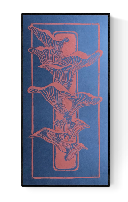 Handmade linocut print of coral-colored mushrooms growing from a piece of wood on a deep blue background; organic nature-inspired artwork, 25.5 x 50 cm by Belgian artist Leda Vaes.