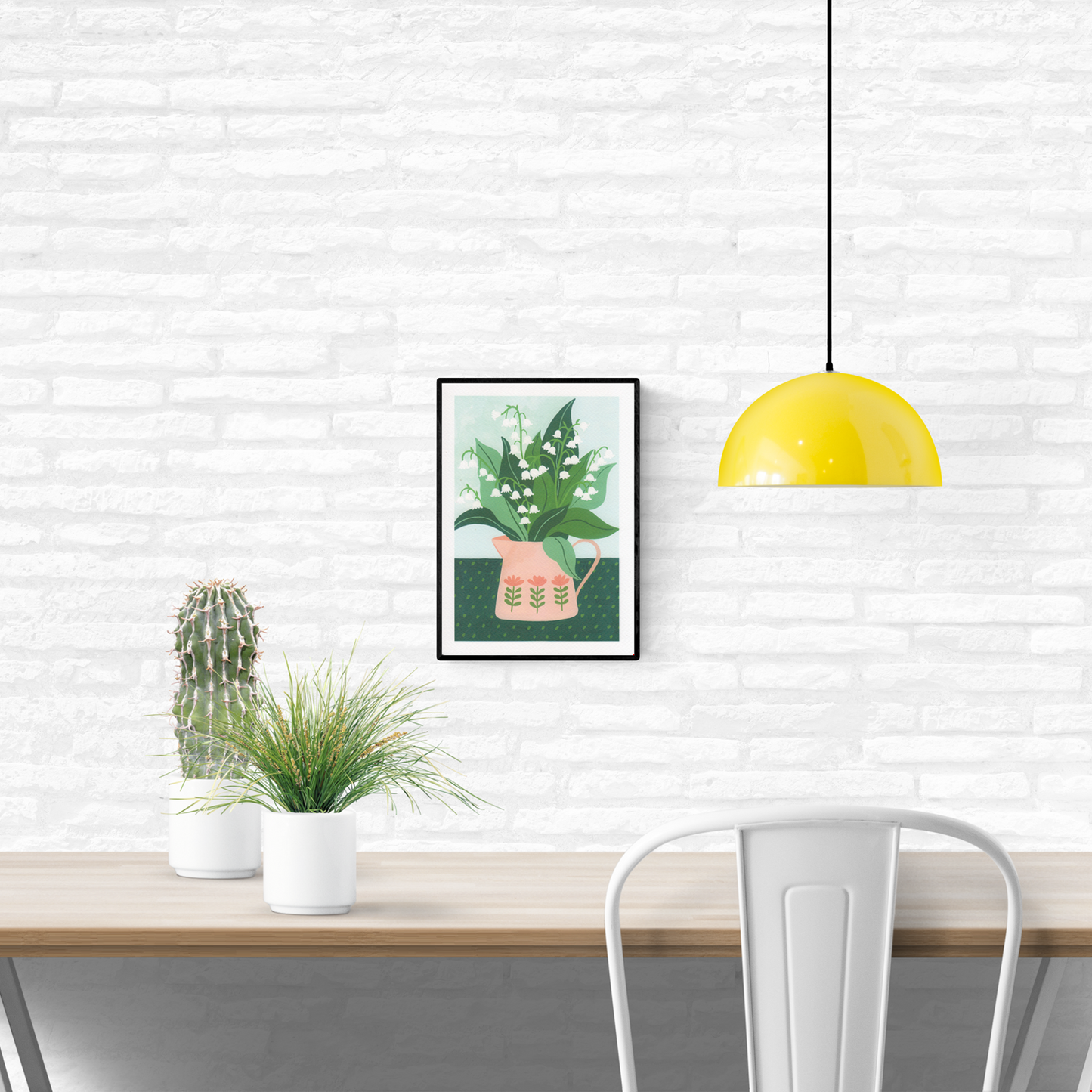 Floral digital art print titled “Lily of the Valley” by Belgian illustrator Leens, featuring white bell-shaped flowers and lush green leaves in a soft pink pitcher with folk flower motifs, printed on A4 textured art paper.