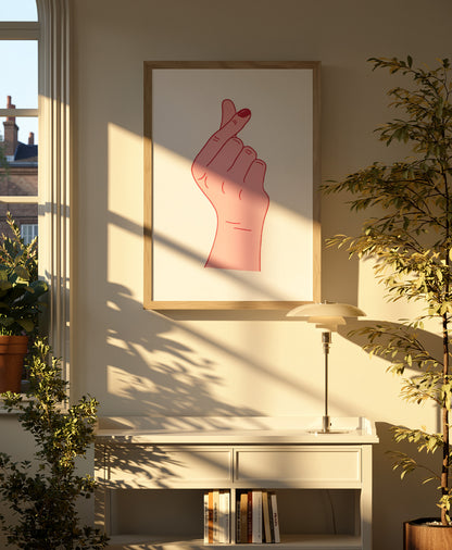 Screenprint artwork titled “Heart” by Studio Stoutpoep showing a pink hand making a Korean-style finger heart gesture on a white background. Minimalist A2 art print made in Belgium, ideal for modern interiors and pop art lovers.