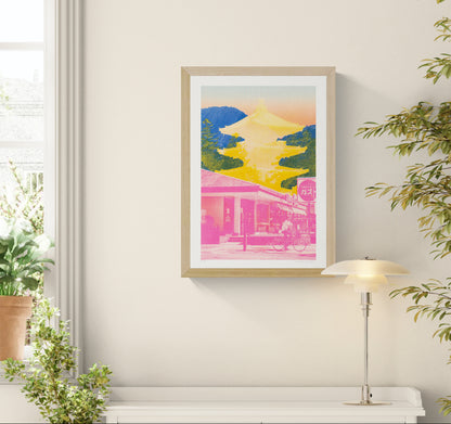Bold Japan-inspired art print with pink urban street scene, cyclist, yellow Fuji pagoda silhouette and deep blue mountain background – Fuji Landscape Collage 2 by Dutch artist PTRVRKD, A3 risograph print, limited edition.