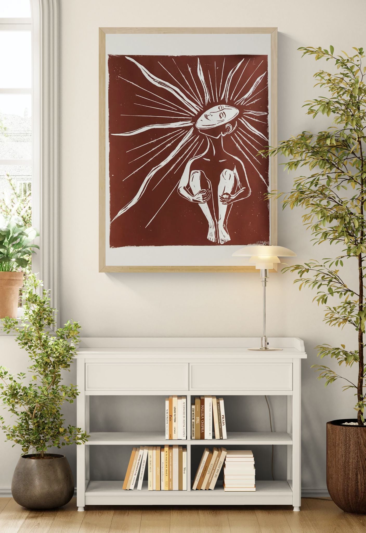 Zonnekind by Leda Vaes, large handmade brown and white linocut print featuring a seated human figure with radiant abstract sun rays extending from the head, expressive contemporary wall art on handmade paper