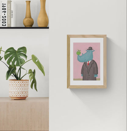 Surreal rhino illustration by Willy Leung featuring a blue rhinoceros in a formal suit and hat holding a green apple against a soft pink background, printed as an A4 archival giclée art print.