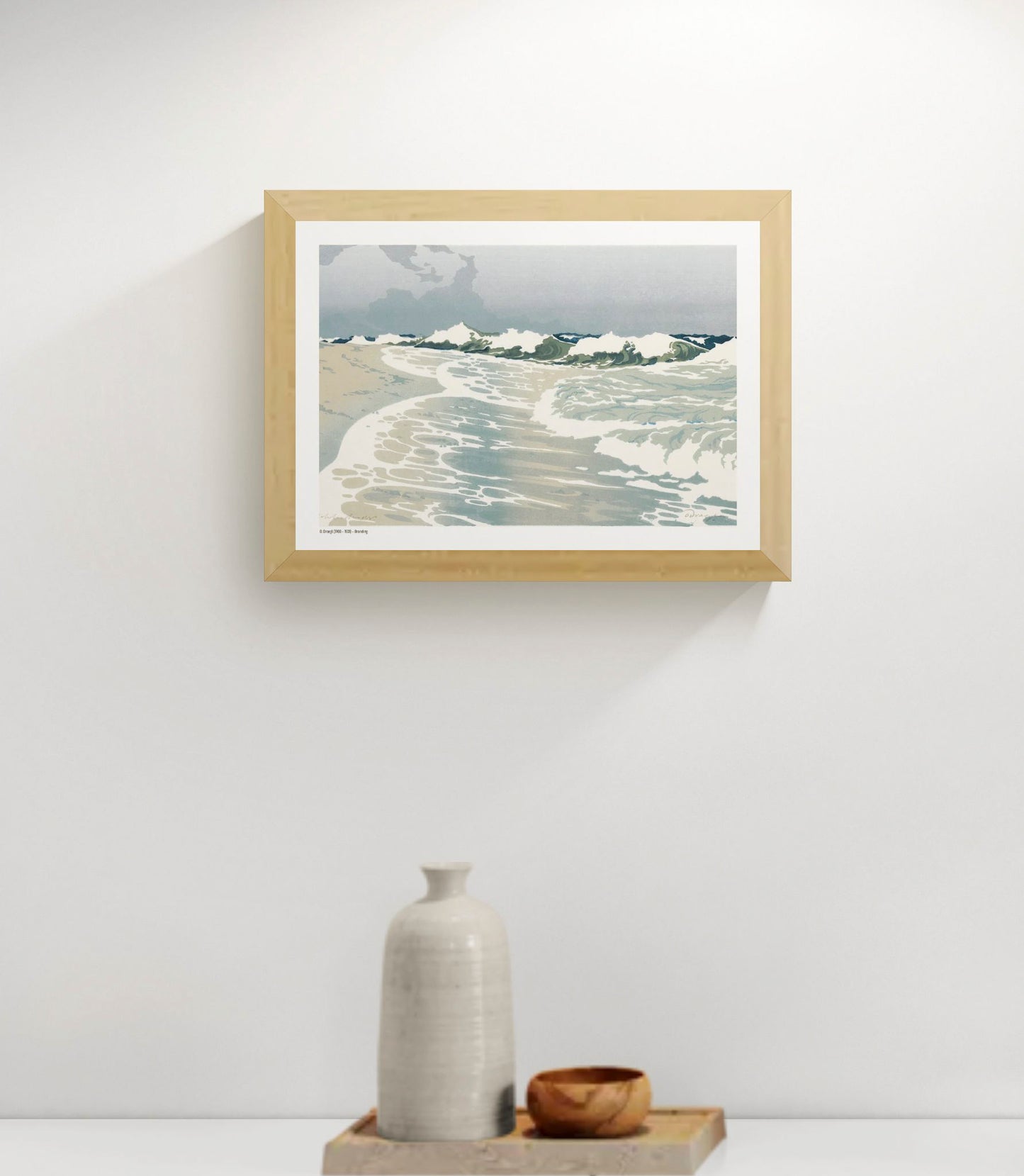 Horizontal coastal art print showing rolling ocean waves, white sea foam and a pale blue sky in a vintage colour woodcut style, ideal for calm living room, bedroom or coastal wall decor.