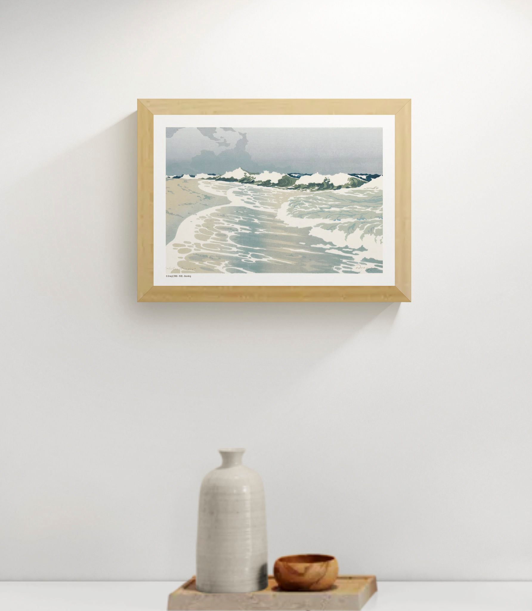Horizontal coastal art print showing rolling ocean waves, white sea foam and a pale blue sky in a vintage colour woodcut style, ideal for calm living room, bedroom or coastal wall decor.