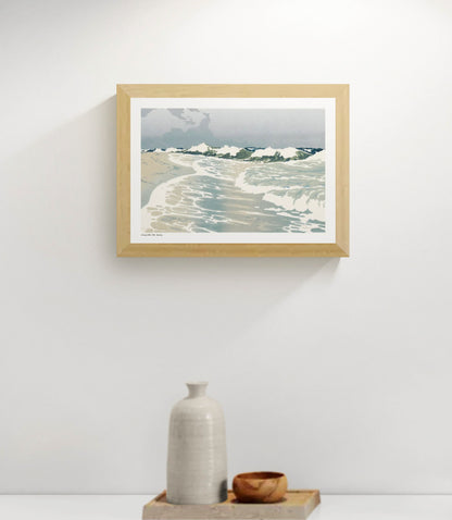 Horizontal coastal art print showing rolling ocean waves, white sea foam and a pale blue sky in a vintage colour woodcut style, ideal for calm living room, bedroom or coastal wall decor.