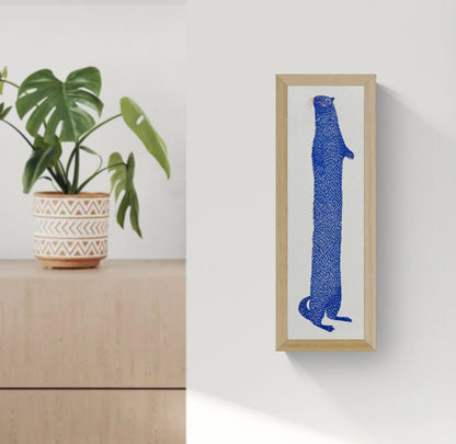 Tall blue otter illustration by Strangford, printed as a risograph on recycled paper in a narrow vertical format, playful wall art for quirky modern home decor.