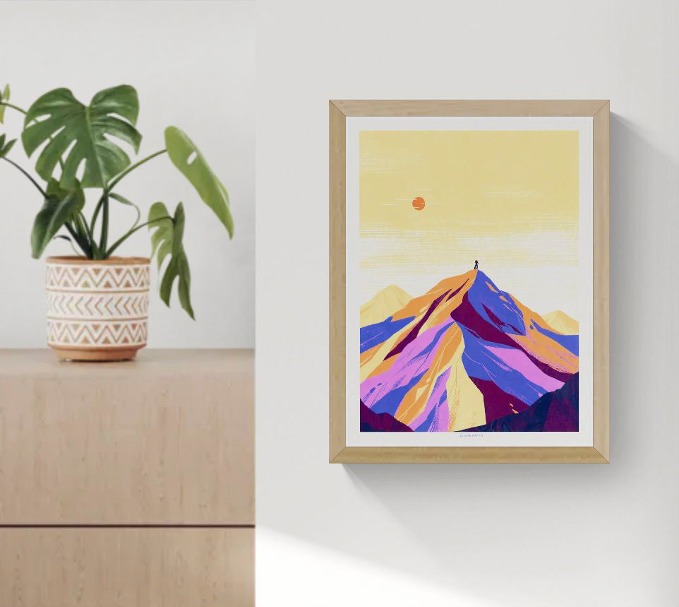 Vertical giclée art print of a lone figure standing on an Alpine mountain peak, illustrated in vivid purple, orange, pink and pale yellow tones, ideal as colourful wall art for a living room, office or studio.
