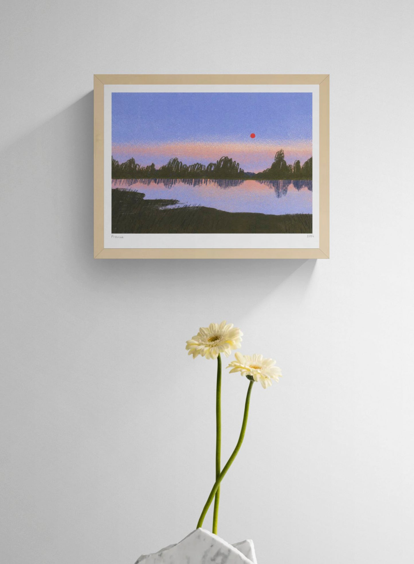 France by Linde Raats, horizontal giclée print of a quiet lake at dusk with violet sky, dark green trees, soft reflections and a red sun, ideal for calm bedroom or living room wall decor.
